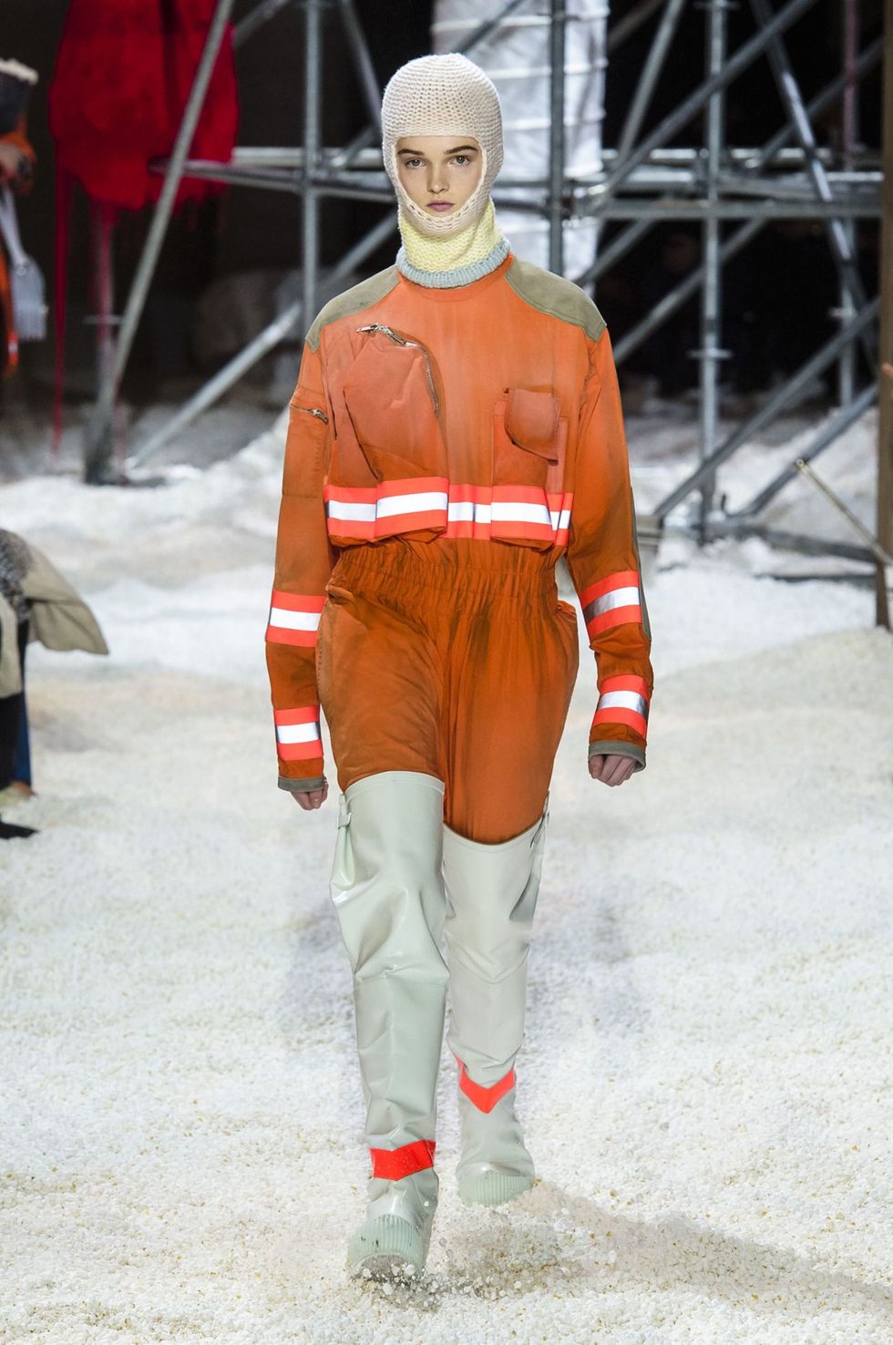Fashion, Orange, Red, Runway, Fashion show, Outerwear, Winter, Personal protective equipment, 