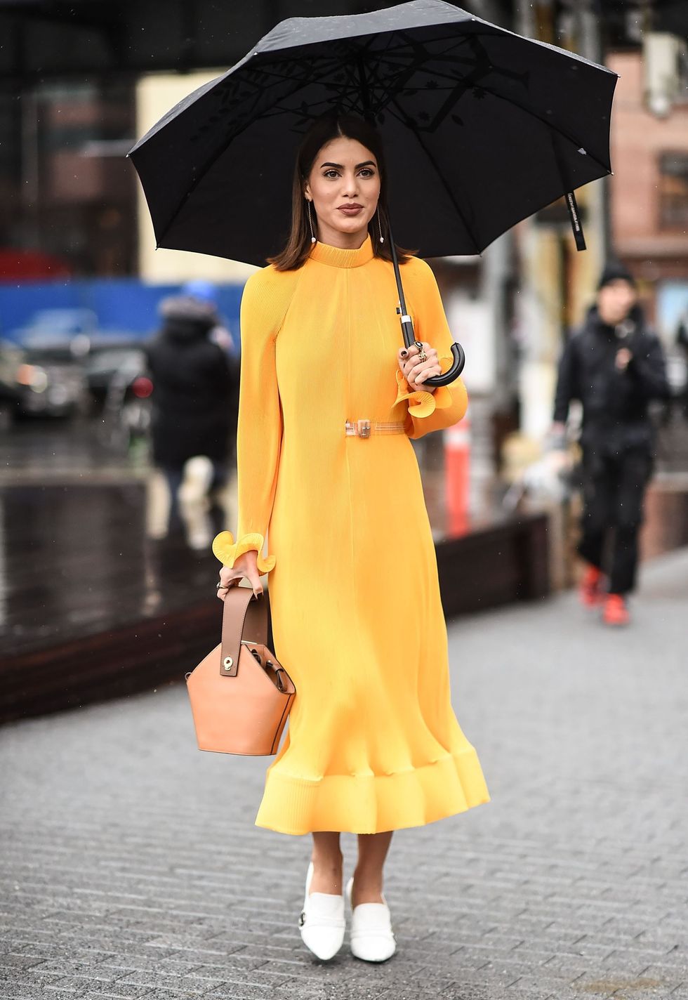 Street fashion, Yellow, Clothing, Shoulder, Fashion, Fashion model, Orange, Dress, Umbrella, Beauty, 