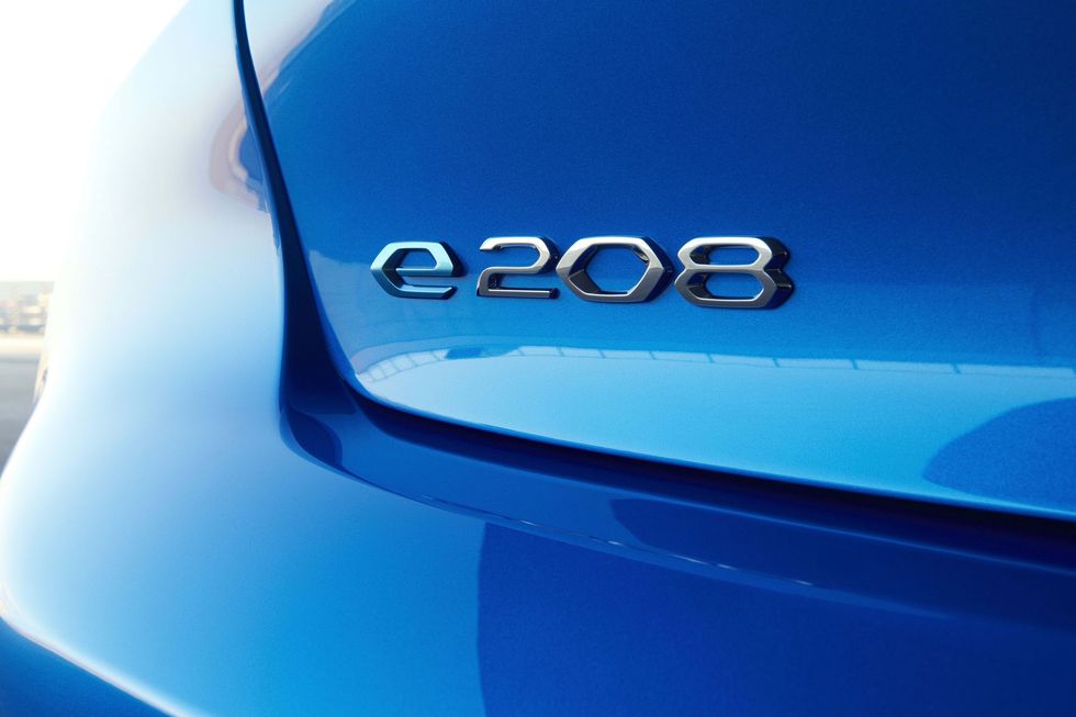 Motor vehicle, Blue, Automotive exterior, Electric blue, Logo, Teal, Aqua, Azure, Turquoise, Symbol, 