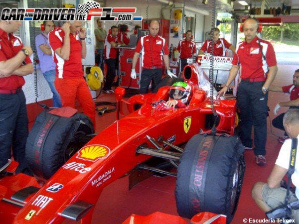 Tire, Wheel, Automotive tire, Automotive design, Open-wheel car, Formula one tyres, Automotive wheel system, Red, Formula one, Formula one car, 