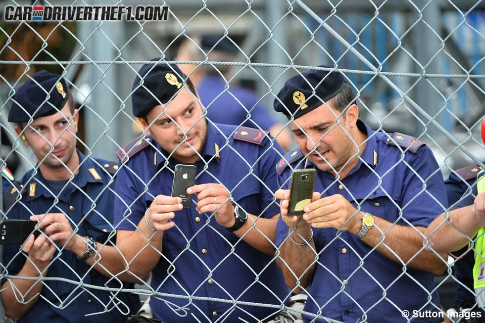 Finger, Wrist, Cap, Mesh, Gesture, Thumb, Wire fencing, Baseball cap, Fence, Chain-link fencing, 