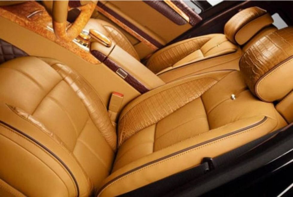 Motor vehicle, Mode of transport, Brown, Yellow, Car seat, Car, Car seat cover, Tan, Vehicle door, Leather, 