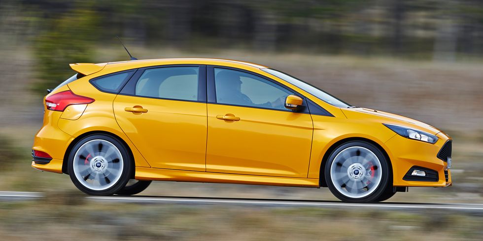 Tire, Wheel, Automotive design, Yellow, Vehicle, Car, Hatchback, Rim, Auto part, Orange, 