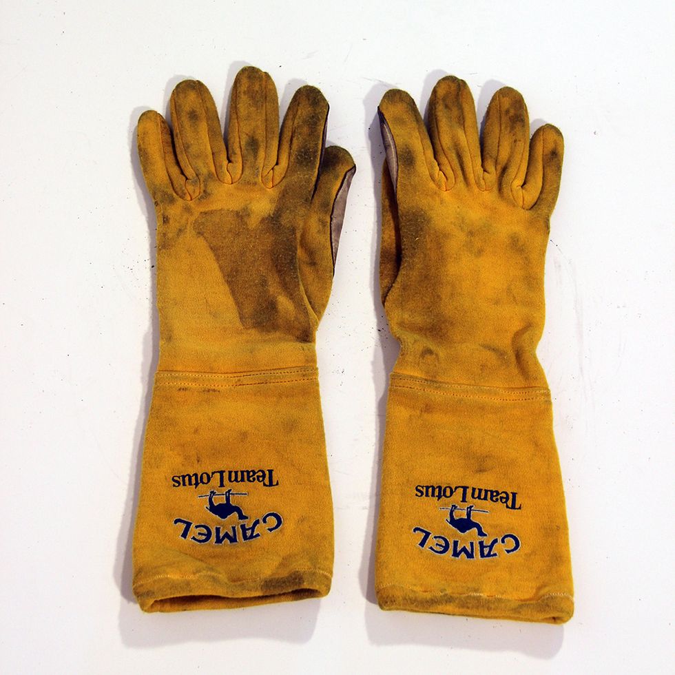 Glove, Personal protective equipment, Safety glove, Yellow, Hand, Fashion accessory, Finger, 