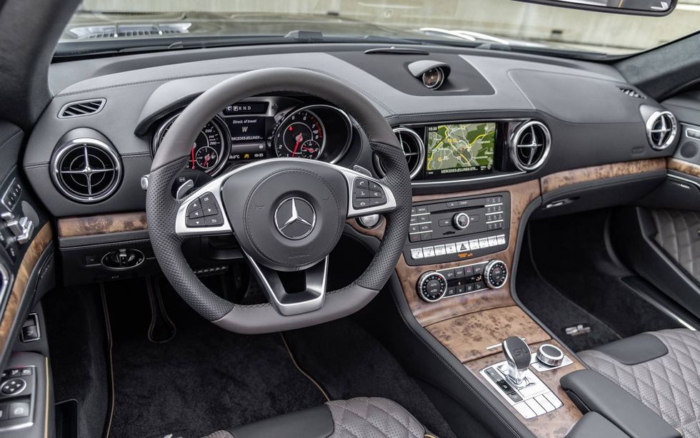 Land vehicle, Vehicle, Car, Center console, Steering wheel, Motor vehicle, Gear shift, Luxury vehicle, Personal luxury car, Mercedes-benz, 