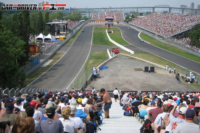 Crowd, Infrastructure, Road, Mammal, Race track, Asphalt, Urban design, Racing, Thoroughfare, Lane, 