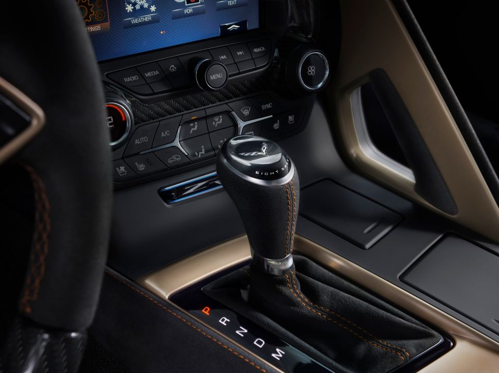 Vehicle, Center console, Luxury vehicle, Gear shift, Car, Personal luxury car, Steering wheel, 