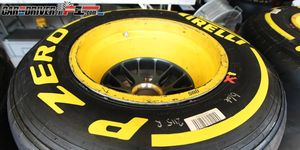 Automotive tire, Yellow, Rim, Automotive wheel system, Synthetic rubber, Tread, Light, Carbon, Auto part, Gas, 