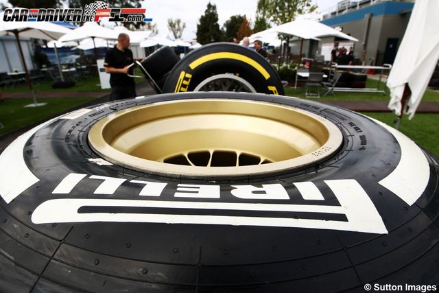 Automotive tire, Tent, Logo, World, Circle, Space, Automotive wheel system, Synthetic rubber, Engineering, Canopy, 