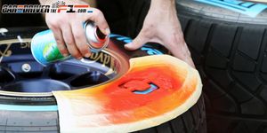 Automotive tire, Tread, Synthetic rubber, Orange, Automotive wheel system, Rim, Nail, Gas, Tire care, Plastic, 