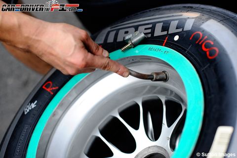 Automotive tire, Rim, Automotive wheel system, Alloy wheel, Spoke, Logo, Synthetic rubber, Auto part, Tread, Machine, 