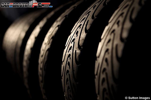 Automotive tire, Text, Line, Colorfulness, Black, Parallel, Close-up, Still life photography, Synthetic rubber, Tread, 
