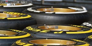 Tire, Automotive tire, Yellow, Automotive wheel system, Synthetic rubber, Rim, Tread, Amber, Auto part, Black, 