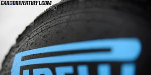 Text, Automotive tire, Font, Synthetic rubber, Parallel, Electric blue, Gas, Close-up, Graphics, Tread, 