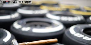 Automotive tire, Colorfulness, Gas, Circle, Synthetic rubber, Still life photography, Close-up, Number, Cylinder, Tread, 