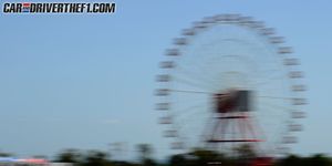 Nature, Ferris wheel, Automotive design, Daytime, Automotive tire, Open-wheel car, Photograph, Motorsport, Red, Formula racing, 