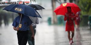 Clothing, Human, Umbrella, Standing, Red, Rain, Street fashion, Precipitation, Walking, Drizzle, 