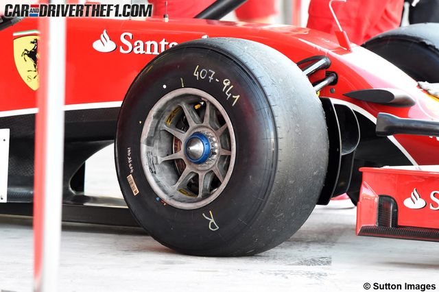 Motor vehicle, Tire, Automotive tire, Automotive design, Automotive wheel system, Open-wheel car, Rim, Formula one tyres, Formula one, Red, 