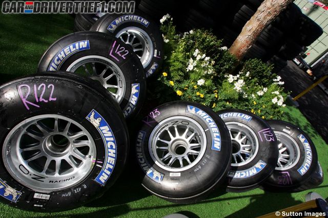Automotive tire, Automotive wheel system, Rim, Alloy wheel, Synthetic rubber, Auto part, Logo, Formula one tyres, Hubcap, Tread, 