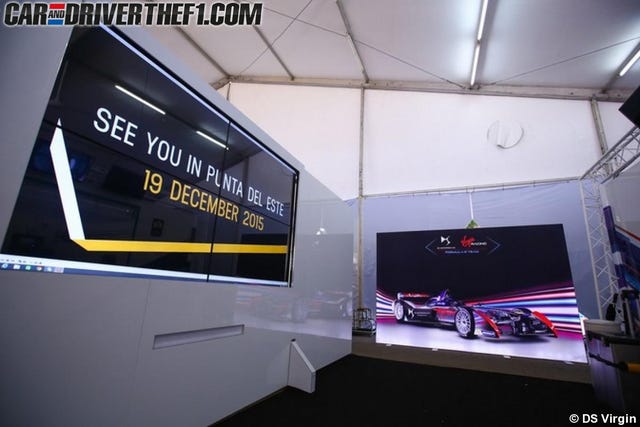 Ceiling, Advertising, Luxury vehicle, Race car, Brand, Touring car racing, Garage, Kit car, Performance car, Graphics, 