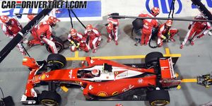 Red, Team, Racing, Sports gear, Motorsport, Carmine, Automotive tire, Open-wheel car, Personal protective equipment, Race track, 