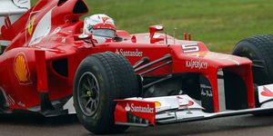 Tire, Wheel, Automotive tire, Automotive design, Open-wheel car, Vehicle, Automotive wheel system, Red, Car, Formula one, 