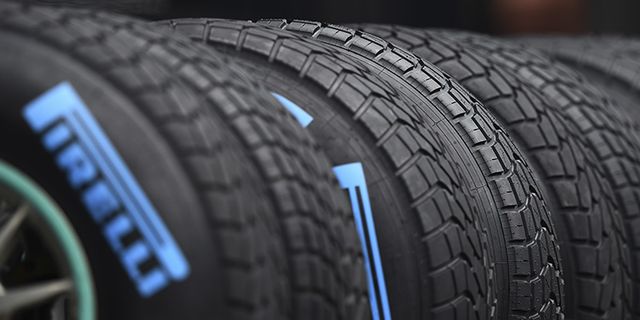 Tire, Automotive tire, Blue, Automotive wheel system, Rim, Synthetic rubber, Tread, Carbon, Azure, Black, 