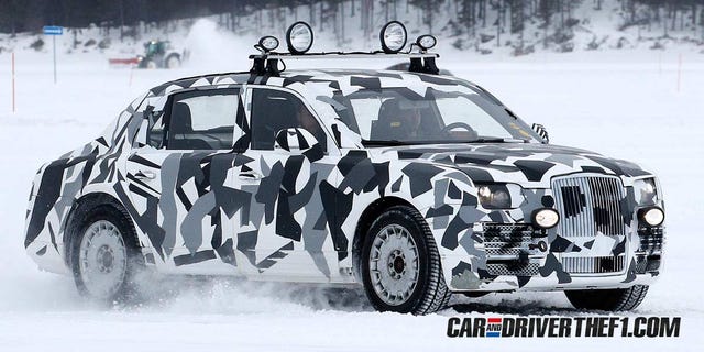 Land vehicle, Vehicle, Car, Luxury vehicle, Snow, Mid-size car, Bmw, Winter storm, Ice racing, Crossover suv, 