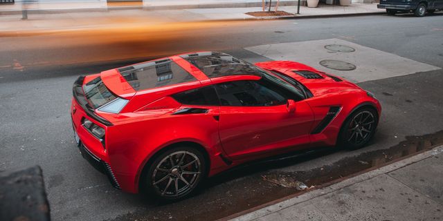 Land vehicle, Vehicle, Car, Sports car, Corvette stingray, Automotive design, Red, Supercar, Performance car, Rim, 