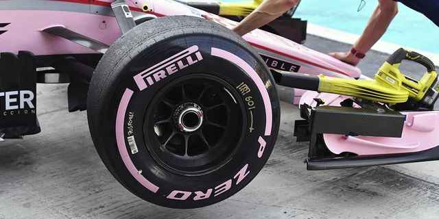 Tire, Automotive tire, Vehicle, Formula one tyres, Wheel, Pink, Formula one, Car, Formula one car, Rim, 