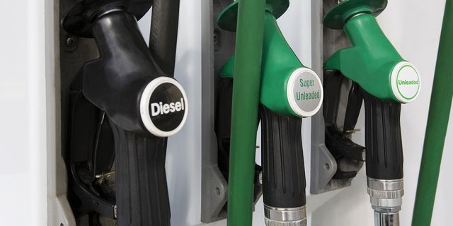 Green, Gas pump, Bicycle fork, Gasoline, Filling station, Fuel, Auto part, Business, Bottle, Bicycle part, 