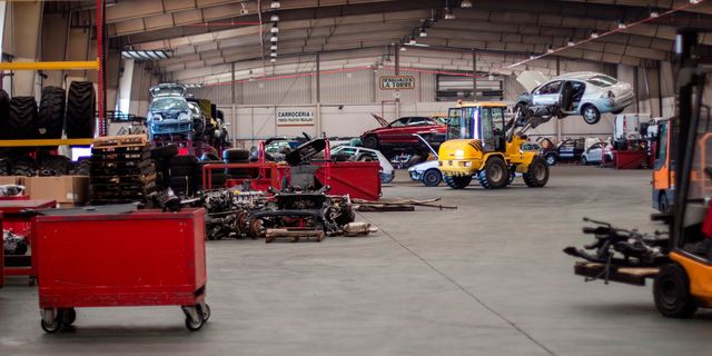 Motor vehicle, Vehicle, Automobile repair shop, Transport, Factory, Car, Machine, Building, Workshop, 