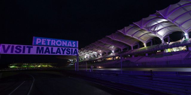 Purple, Light, Night, Metropolitan area, Lighting, Sport venue, Architecture, Violet, Sky, Stadium, 