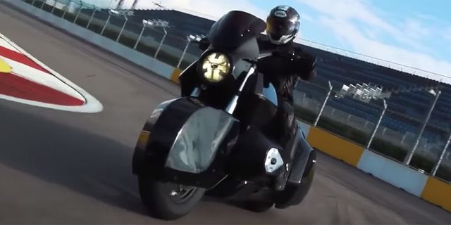 Vehicle, Scooter, Motorcycling, Automotive design, Motorcycle helmet, Mode of transport, Motorcycle, Race track, Automotive lighting, Automotive exterior, 