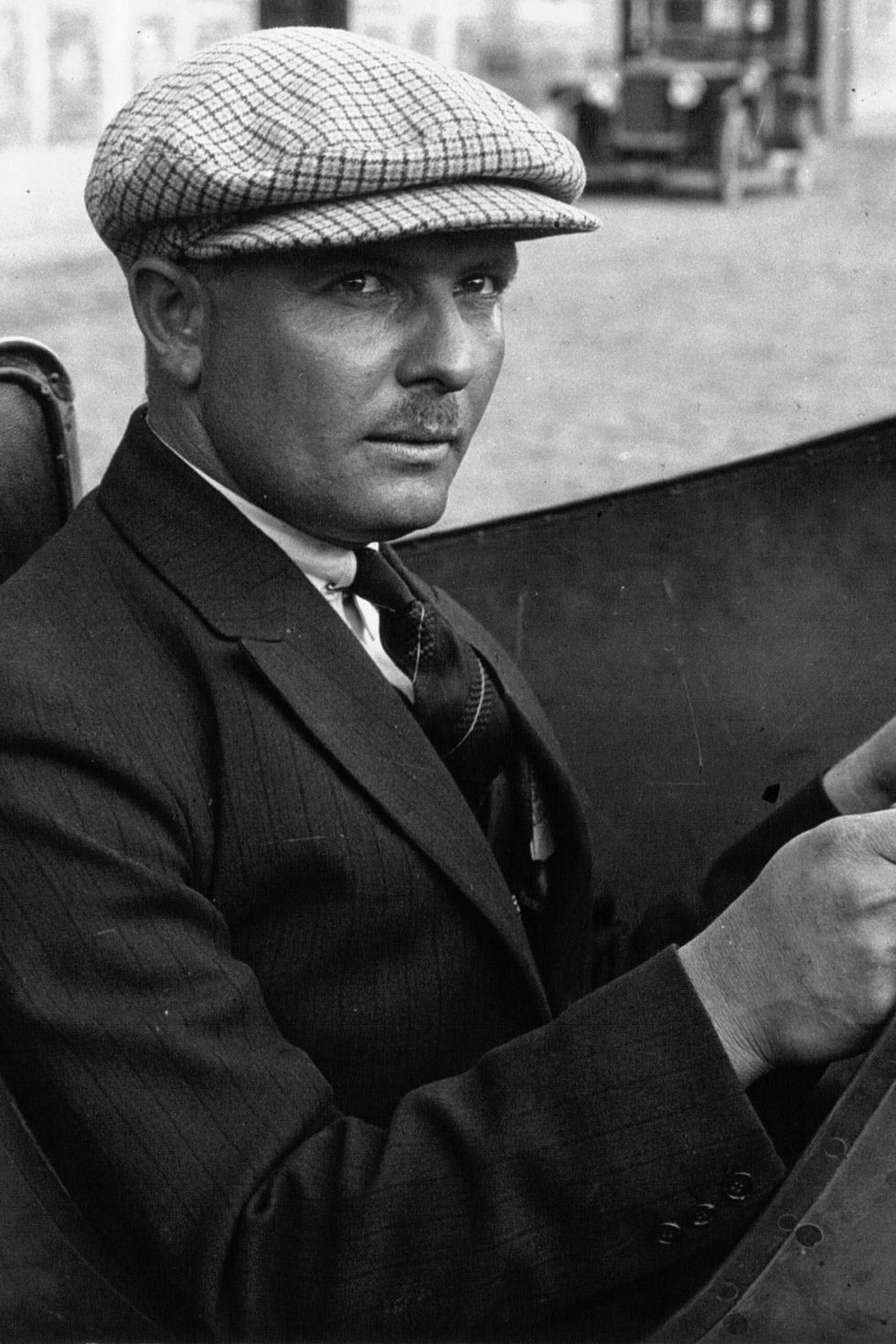 Black-and-white, Headgear, Photography, Cap, Sitting, Monochrome, Monochrome photography, White-collar worker, Hat, Suit, 