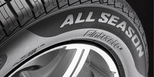 Tire, Synthetic rubber, Automotive tire, Wheel, White, Auto part, Automotive wheel system, Tread, Formula one tyres, Rim, 