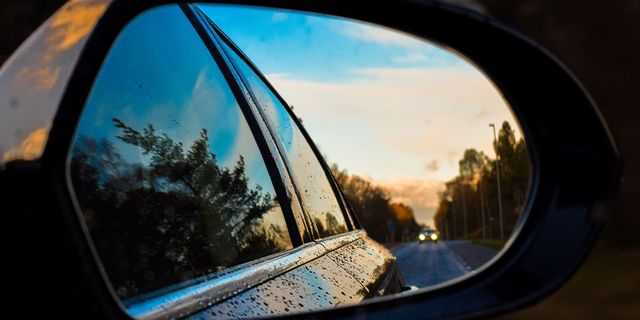 Rear-view mirror, Reflection, Automotive mirror, Sky, Auto part, Photography, Mirror, Tints and shades, Tree, Lens, 
