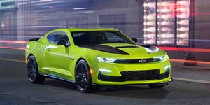 Land vehicle, Vehicle, Car, Chevrolet camaro, Motor vehicle, Muscle car, Coupé, Yellow, Sports car, Performance car, 