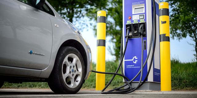 motor vehicle, filling station, vehicle door, gas pump, vehicle, yellow, car, fuel, wheel, gasoline,