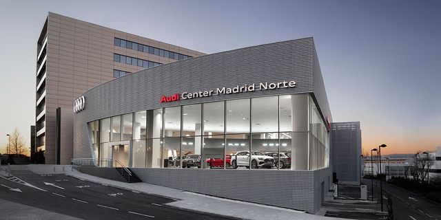 Building, Architecture, Facade, Commercial building, Car, Vehicle, Mixed-use, Metal, Car dealership, 