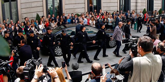 Crowd, Luxury vehicle, Bodyguard, Official, Police officer, Camera, Crew, Law enforcement, Mid-size car, 
