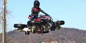 Vehicle, All-terrain vehicle, Motorcycling, Motorcycle, Automotive tire, Engine, Auto part, Recreation, Extreme sport, Wheel, 