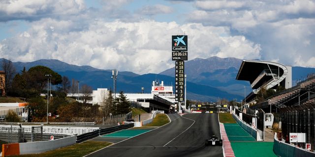 Race track, Road, Sky, Transport, Infrastructure, Freeway, Architecture, Metropolitan area, Sport venue, Tower, 