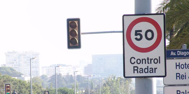 Sign, Signage, Pole, Street light, Circle, Street sign, signaling device, Gas, Traffic sign, Symbol, 