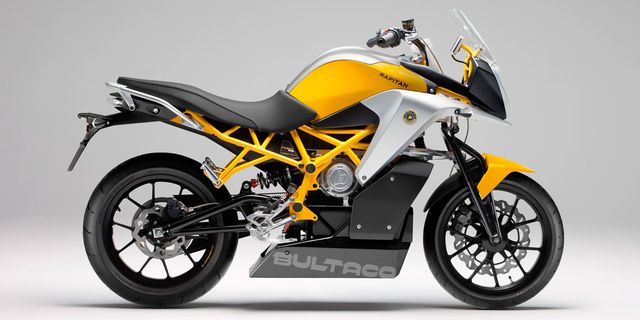 Motorcycle, Wheel, Tire, Motor vehicle, Automotive design, Transport, Vehicle, Automotive tire, Land vehicle, Rim, 