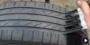 Tire, Automotive tire, Rim, Synthetic rubber, Automotive wheel system, Tread, Fender, Carbon, Black, Grey, 