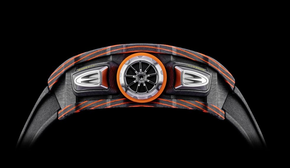 Orange, Automotive design, Watch, Fashion accessory, Concept car, Vehicle, Automotive wheel system, Wheel, Car, Compact car, 