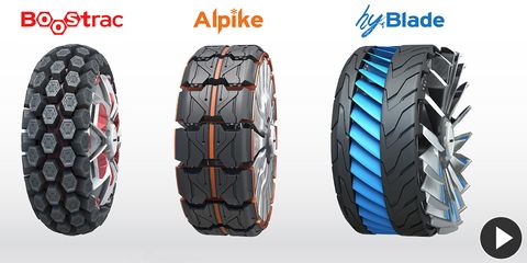Automotive tire, Product, Orange, Rim, Line, Synthetic rubber, Tread, Font, Black, Technology, 
