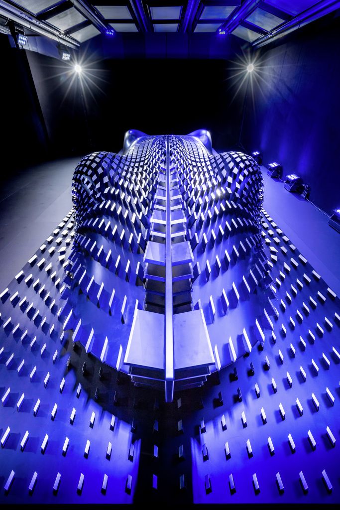 Blue, Stage, Light, Lighting, Electric blue, Architecture, Design, Symmetry, Performing arts center, Visual effect lighting, 