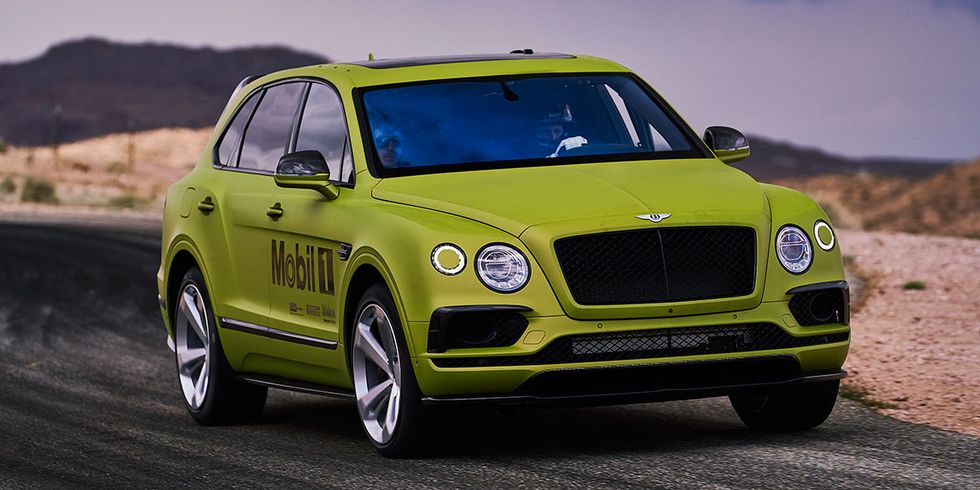 Land vehicle, Vehicle, Car, Motor vehicle, Luxury vehicle, Yellow, Automotive design, Bentley, Performance car, Compact sport utility vehicle, 